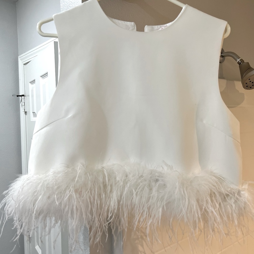 White feather top!